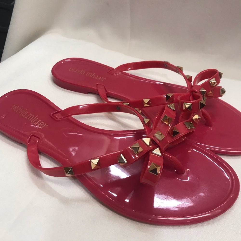 Olivia Miller Pink Rubber/Plastic Flip Flops with Gold Studs and Bow Size 10